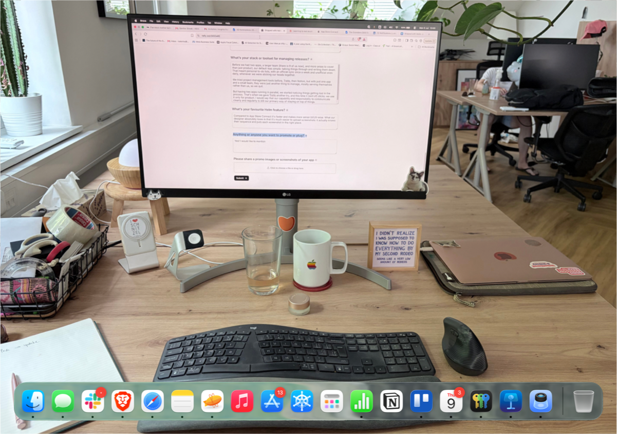 Katarina Lotrič's workstation with a MacBook Air, LG display, Logitech MX Vertical mouse, and Ergo K860 keyboard